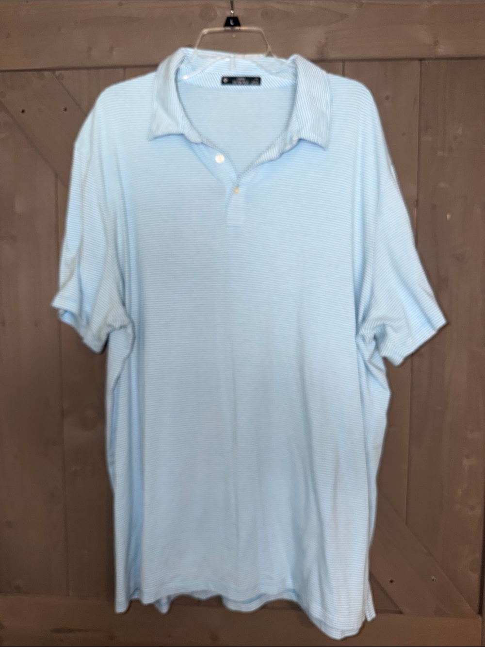 Men's Light Blue Polo Shirt with Subtle Stripe Texture